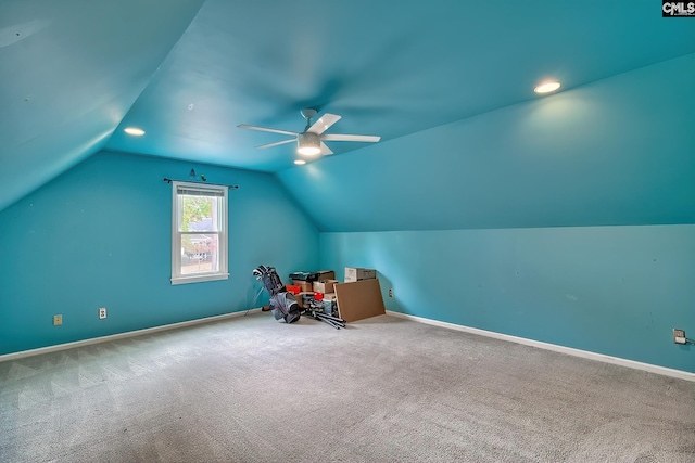 additional living space featuring ceiling fan, lofted ceiling, and carpet