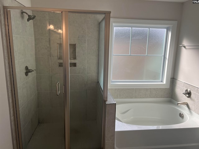 bathroom featuring plus walk in shower