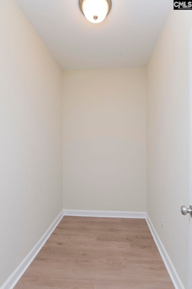 spare room with light hardwood / wood-style floors