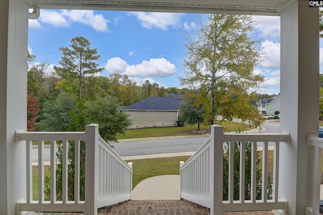 balcony featuring covered porch