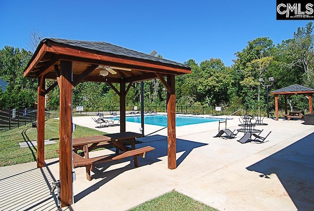 view of pool with a patio and a gazebo