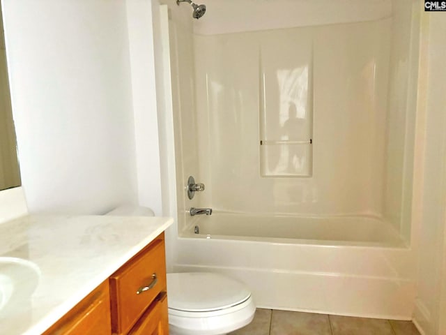 full bathroom with toilet, vanity, tile patterned floors, and bathtub / shower combination