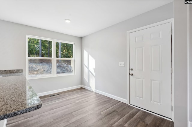 entrance foyer with light hardwood / wood-style flooring