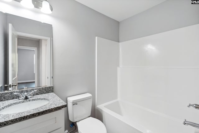 full bathroom with vanity, toilet, and shower / washtub combination