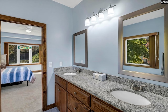 bathroom featuring vanity and ceiling fan