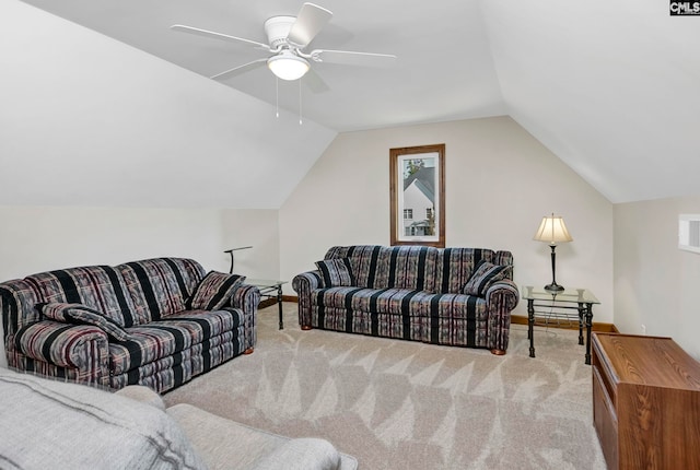 living room featuring ceiling fan, light carpet, and vaulted ceiling