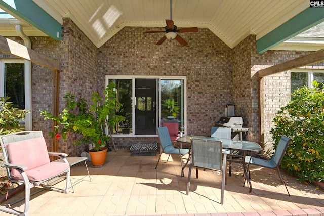 view of patio / terrace featuring ceiling fan and a grill