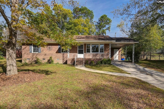 view of front of property with a porch, a front lawn, and a carport