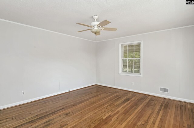 2017 Wellington Rd, Cayce, SC 29033 - empty room with hardwood / wood-style flooring, crown molding, baseboards, and ceiling fan