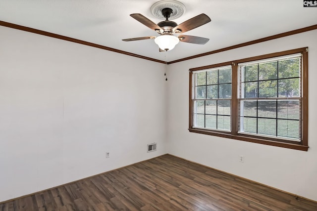 2017 Wellington Rd, Cayce, SC 29033 - unfurnished room with dark wood-type flooring, ceiling fan, and crown molding