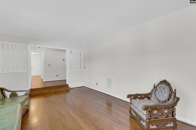 unfurnished room featuring hardwood / wood-style flooring