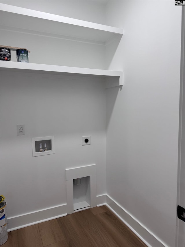 washroom with hookup for a washing machine, dark hardwood / wood-style floors, and hookup for an electric dryer