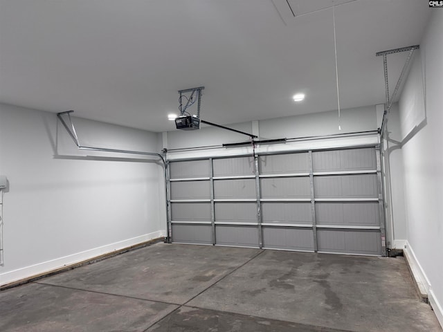 garage featuring a garage door opener