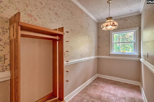 115 Cedar Lake Rd, Blythewood, SC 29016 - tiled empty room with ornamental molding, wallpapered walls, a textured ceiling, a chandelier, and baseboards