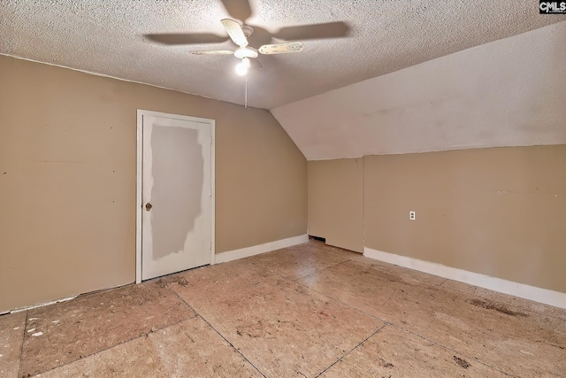 115 Cedar Lake Rd, Blythewood, SC 29016 - bonus room featuring a ceiling fan, lofted ceiling, a textured ceiling, and baseboards