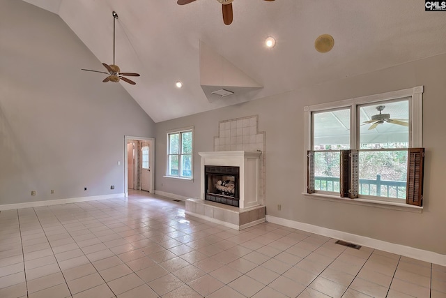 115 Cedar Lake Rd, Blythewood, SC 29016 - unfurnished living room with a ceiling fan, high vaulted ceiling, light tile patterned floors, a fireplace, and baseboards