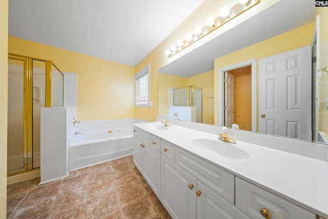 bathroom with independent shower and bath, vanity, and tile patterned floors