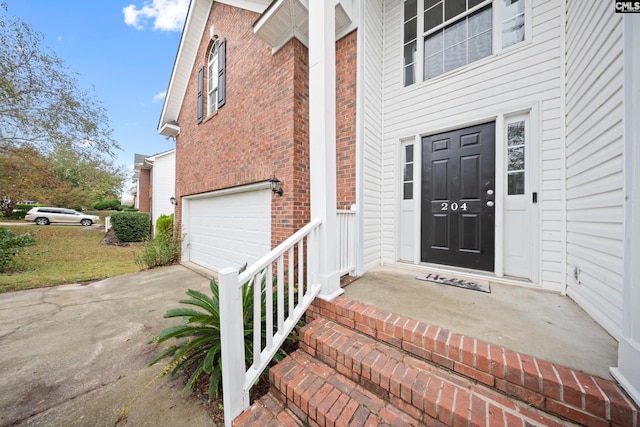 entrance to property featuring a garage