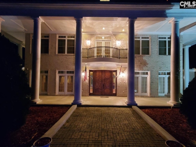 exterior space featuring a patio and french doors