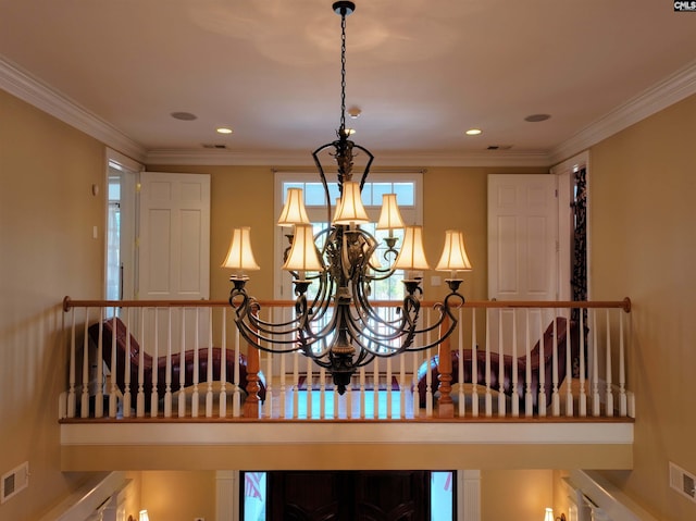 room details featuring a chandelier and crown molding