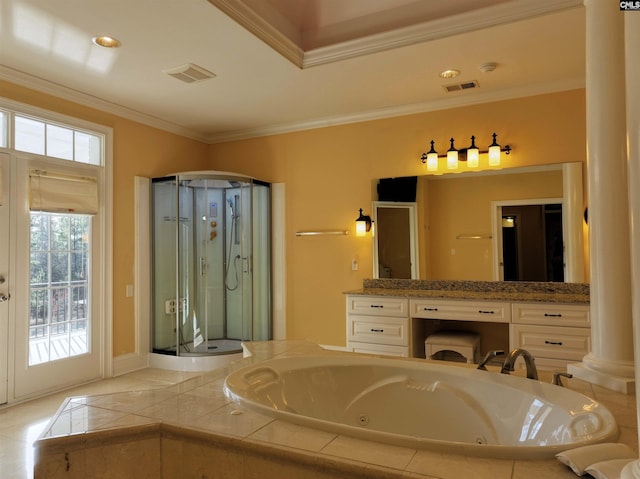 bathroom with ornamental molding, vanity, a healthy amount of sunlight, and separate shower and tub