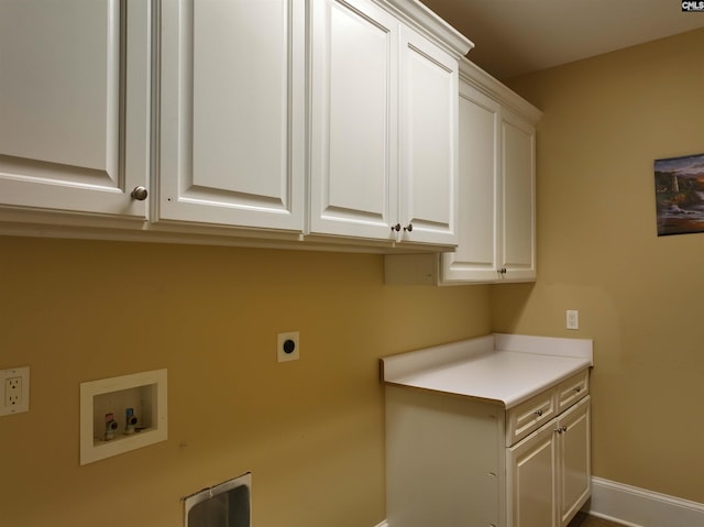 laundry room featuring cabinets, hookup for a washing machine, and hookup for an electric dryer