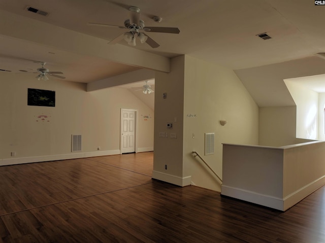 bonus room featuring dark wood-type flooring, vaulted ceiling, and ceiling fan