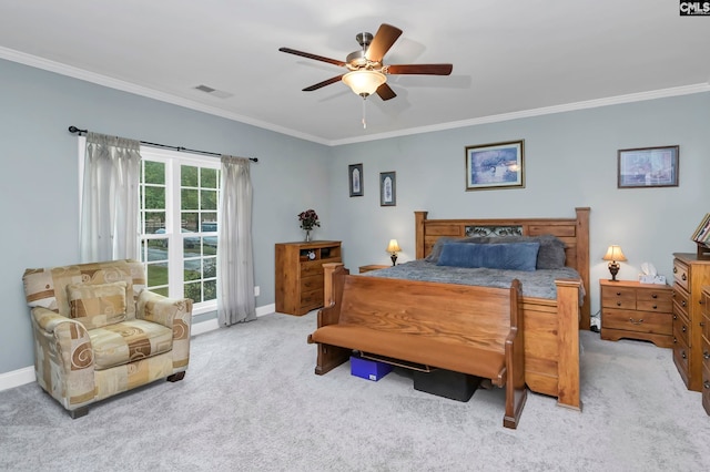 bedroom featuring light colored carpet, ceiling fan, and crown molding