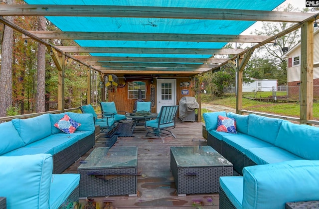 view of patio / terrace featuring a pergola and an outdoor hangout area