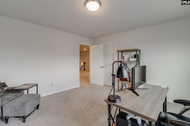 office space with light colored carpet