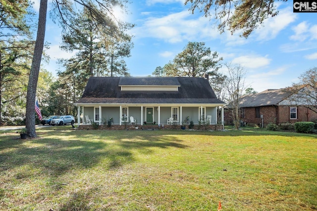 view of front of property with a front yard and covered porch