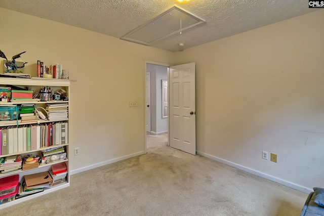 interior space with a textured ceiling