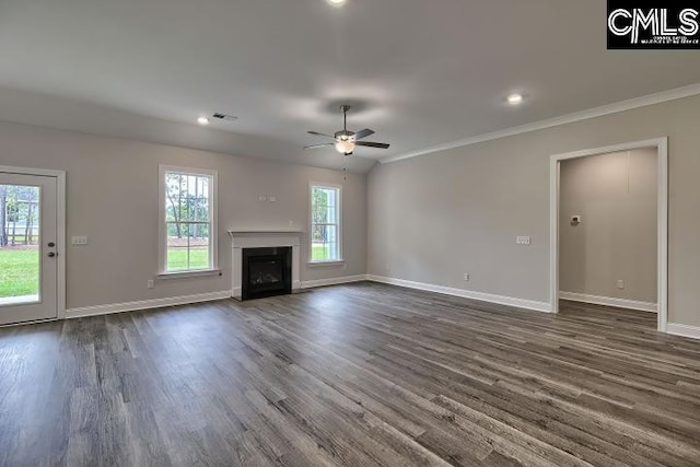 unfurnished living room featuring lofted ceiling, ceiling fan, crown molding, and dark hardwood / wood-style floors