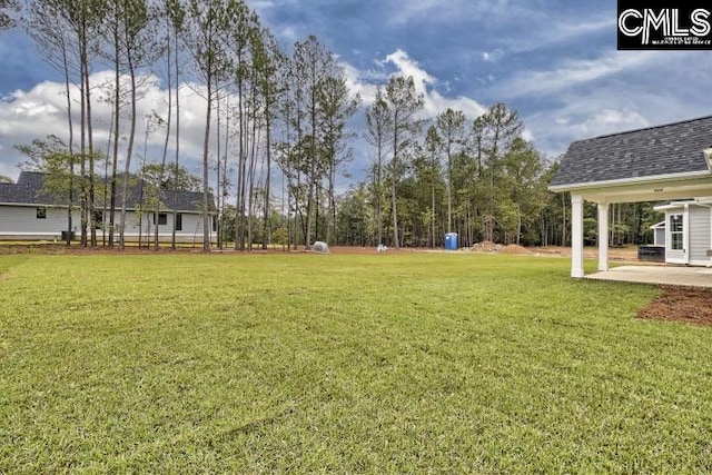 view of yard with a patio area