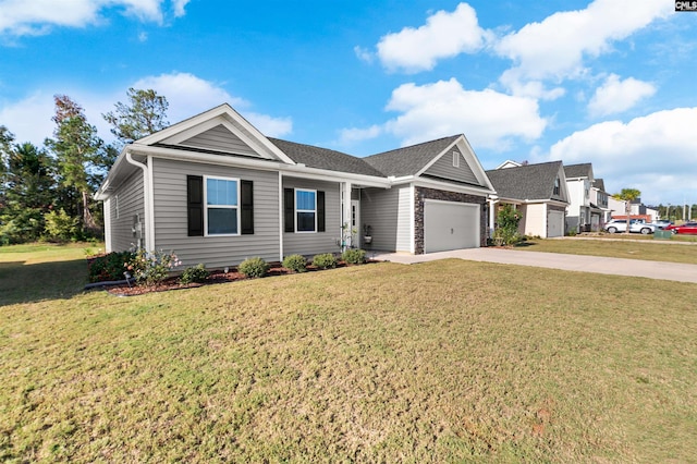 view of front of home with a garage and a front lawn