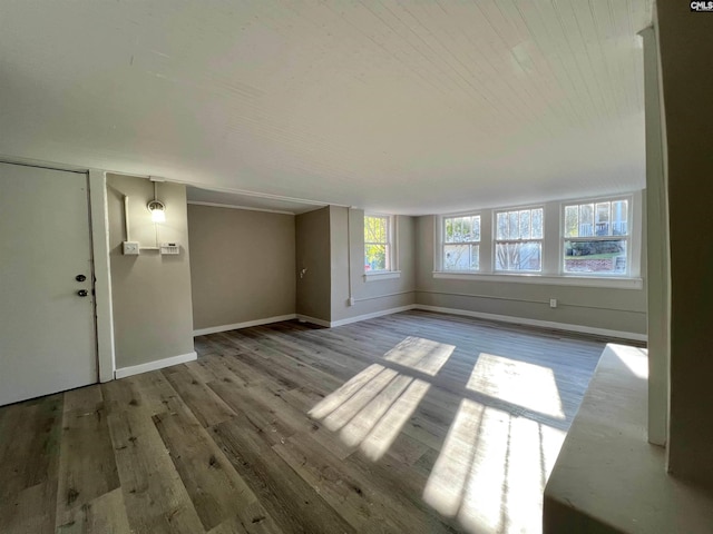 unfurnished living room with light wood-type flooring