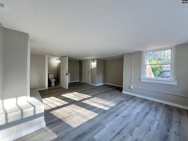 unfurnished room featuring wood-type flooring