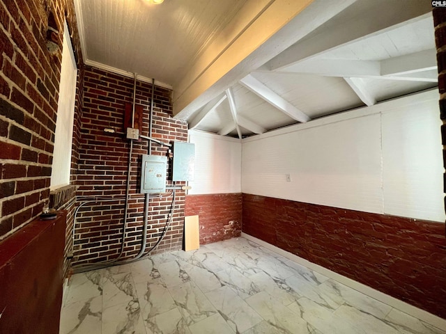 interior space featuring brick wall, beamed ceiling, and wooden ceiling