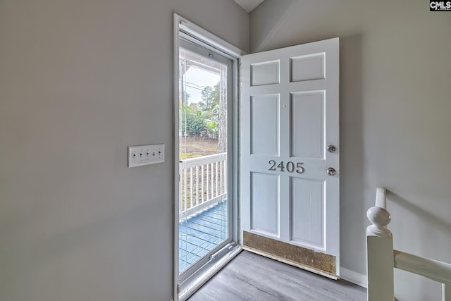 entryway with light hardwood / wood-style flooring