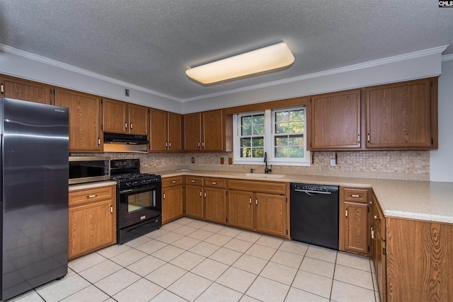 kitchen with black appliances, tasteful backsplash, crown molding, light tile patterned floors, and sink