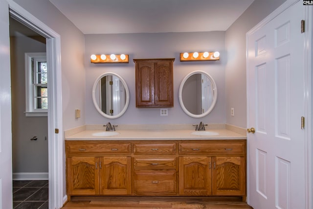 bathroom with vanity and tile patterned floors