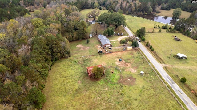 bird's eye view with a water view and a rural view