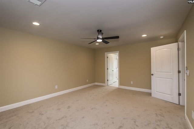 unfurnished bedroom with ceiling fan and light colored carpet