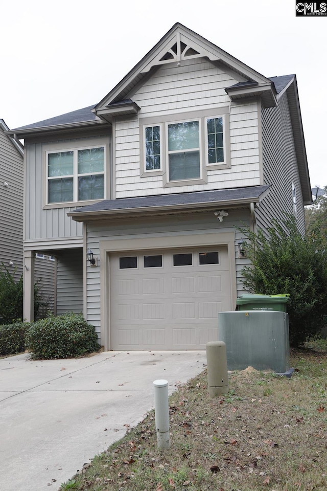 view of front of property featuring a garage