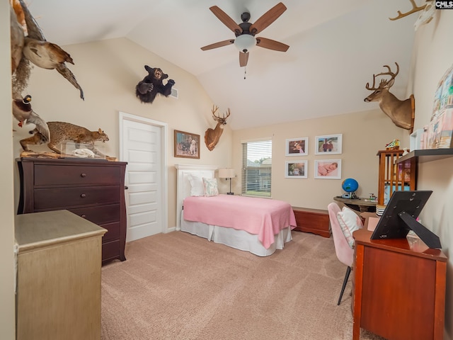 bedroom with lofted ceiling, light carpet, and ceiling fan