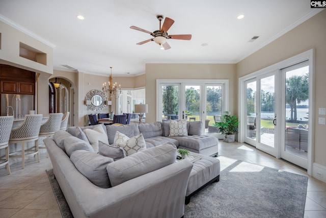 1118 Marble Arch Ct, Chapin, SC 29036 - living room featuring a chandelier, light tile patterned floors, arched walkways, ceiling fan, and recessed lighting