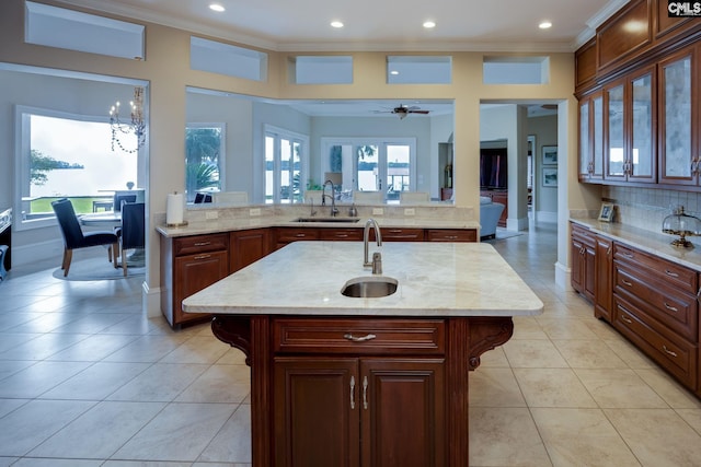 1118 Marble Arch Ct, Chapin, SC 29036 - kitchen featuring a sink, ornamental molding, tasteful backsplash, healthy amount of natural light, and recessed lighting