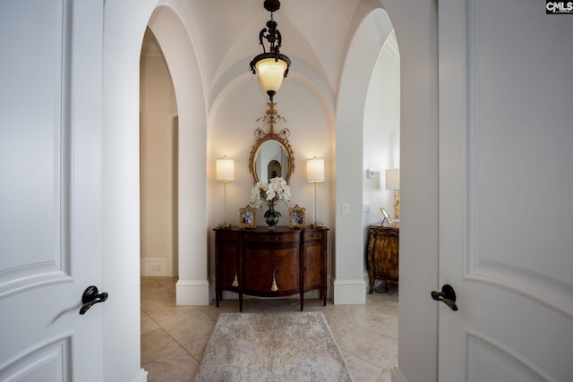 hallway featuring light tile patterned flooring