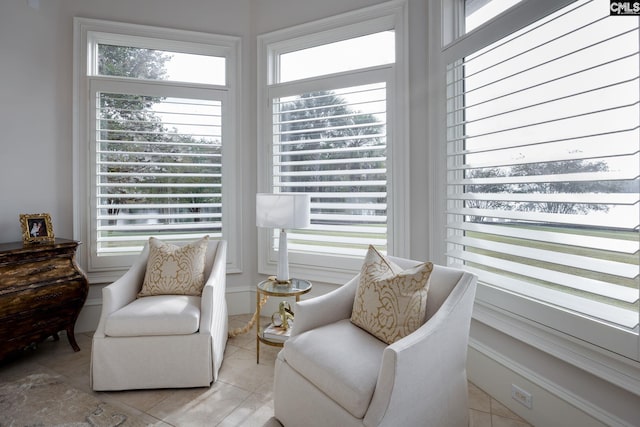 living area featuring light tile patterned floors