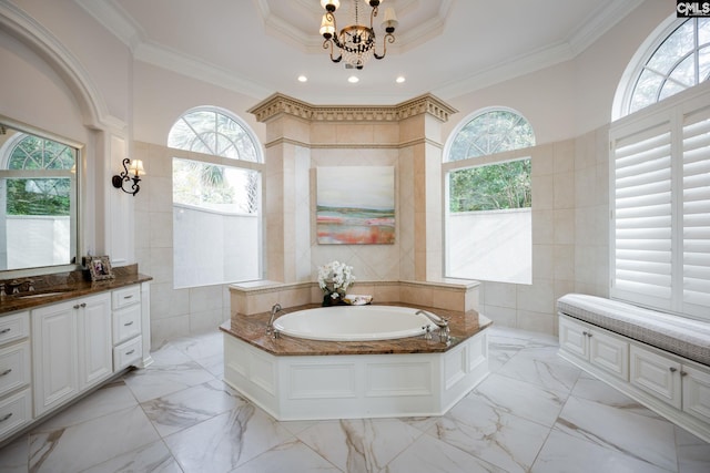 bathroom featuring tile walls, a wealth of natural light, crown molding, and a bathing tub